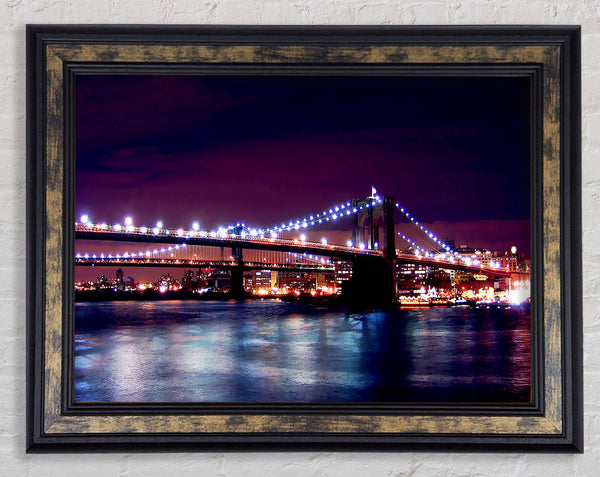 Brooklyn Bridge Lights By The Water Framed Print