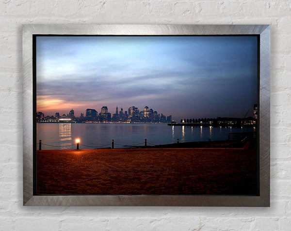 City Across The Water Framed Print