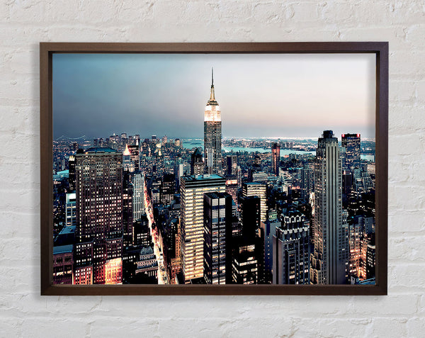 Empire State Building At Dusk Framed Print