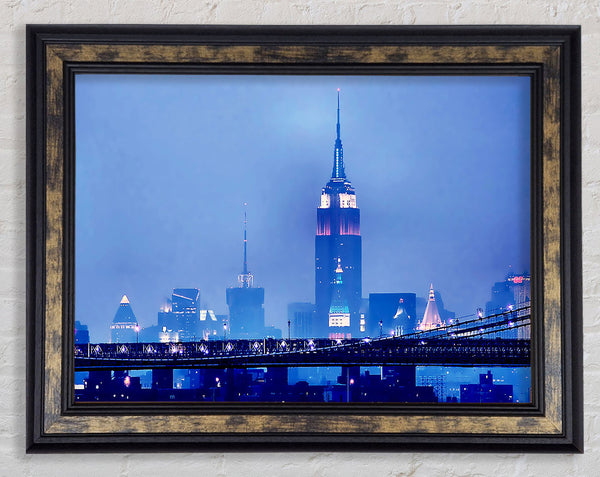 Empire State Building Blue Night Framed Print