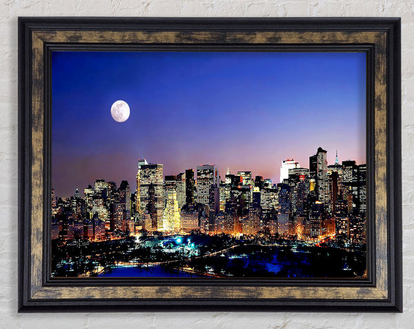 Moon Over Manhattan Framed Print