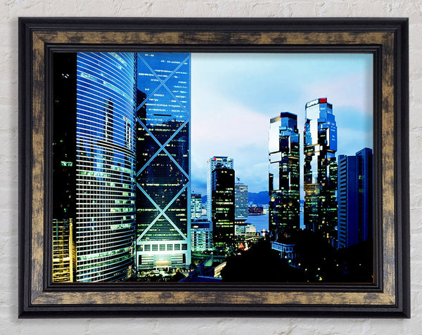 The Glistening Buildings Framed Print