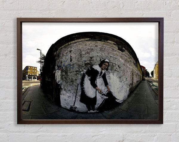 Banksy Maid Sweeping It Under The Carpet Framed Print