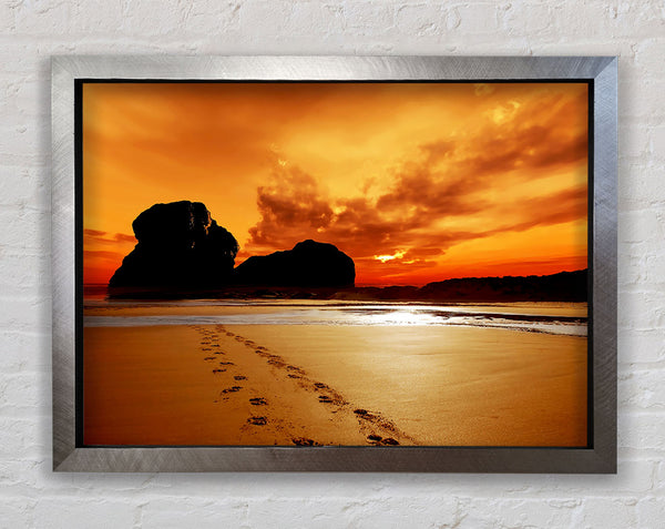 Footprints In The Orange Ocean Sand Framed Print