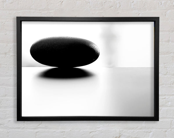 The Balance Of A Black Stone Framed Print