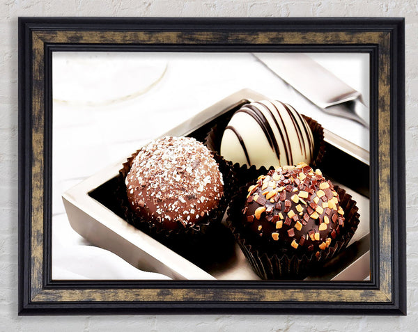 Trio Of Chocolates Framed Print
