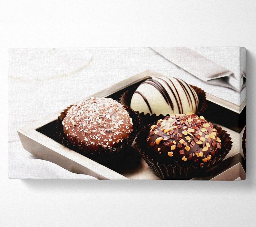  A Canvas Print of Trio Of Chocolates Canvas Art