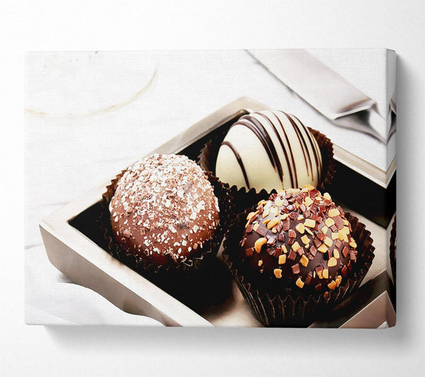  A Canvas Print of Trio Of Chocolates Canvas Art