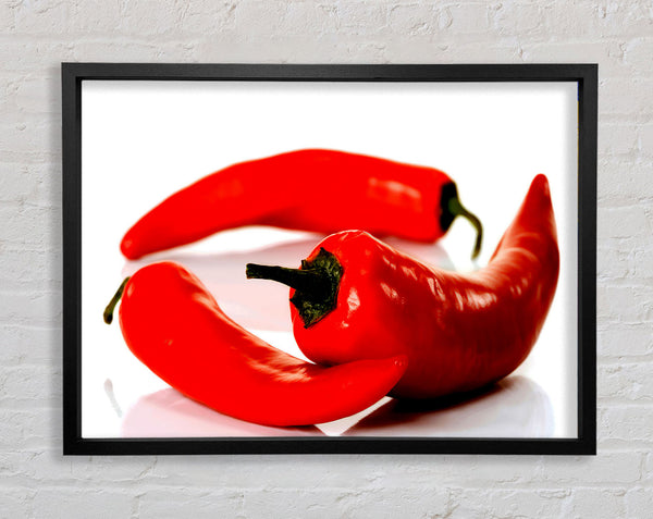 Red Pepper Trio Framed Print