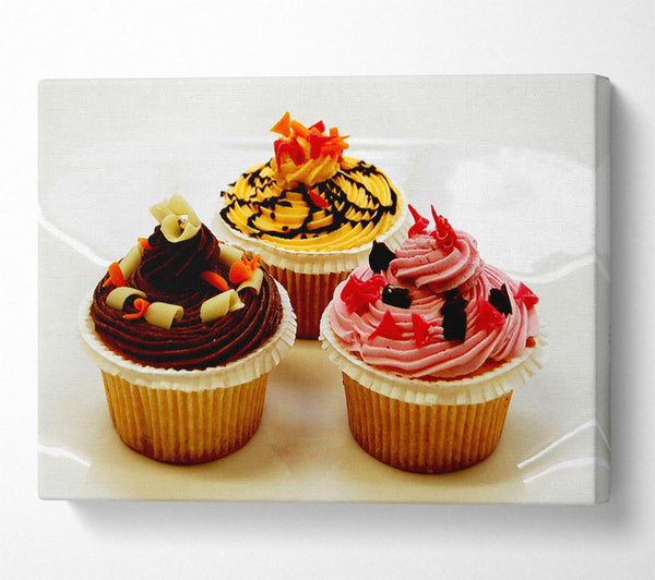  A Canvas Print of Cupcake Trio Canvas Print