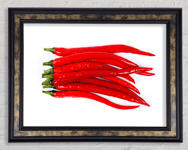 Fire Red Peppers Framed Print