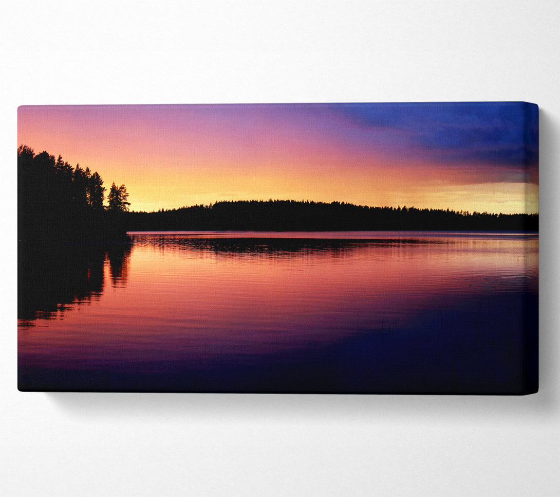 A Canvas Print of Tranquil River Reflections Canvas Print