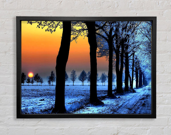 Winter Landscape With Orange Sky Framed Print