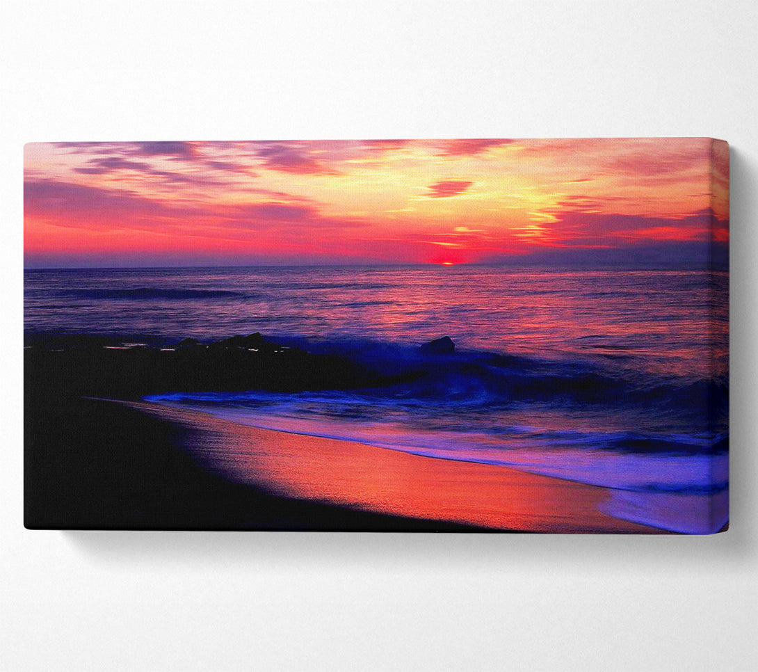  A Canvas Print of Stunning Red Distant Sun Ocean Canvas Art