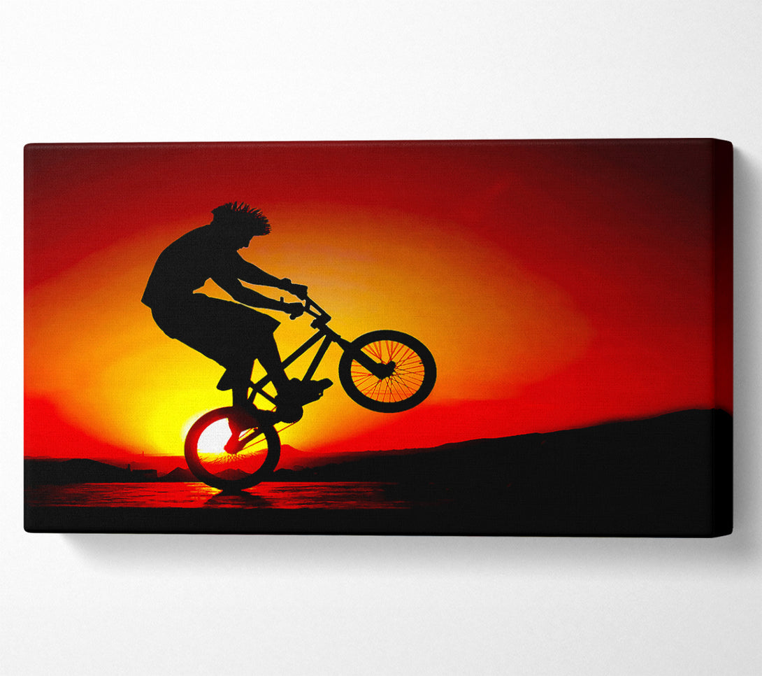  A Canvas Print of Bmx Back Wheelie In Red Sunlight Canvas Art