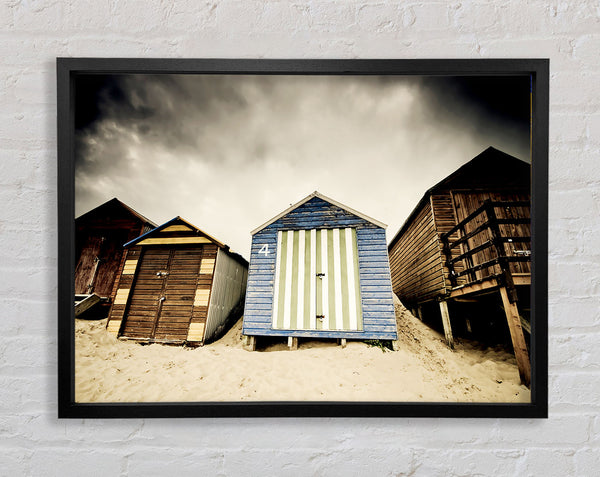 Winter Beach Huts Framed Print