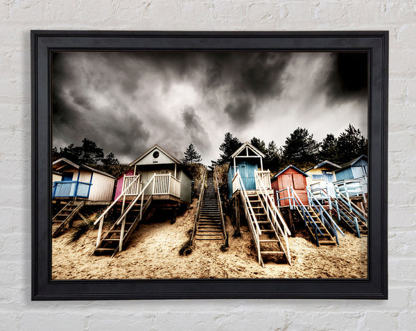Beach Hut Storms Framed Print