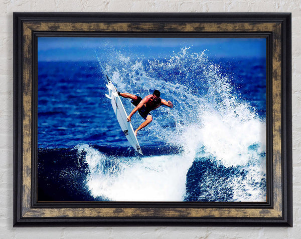 Surfer Jumping The Wave Framed Print