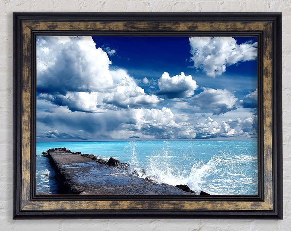 Gentle Waves Crashing In The Cloud Filled Sky Framed Print