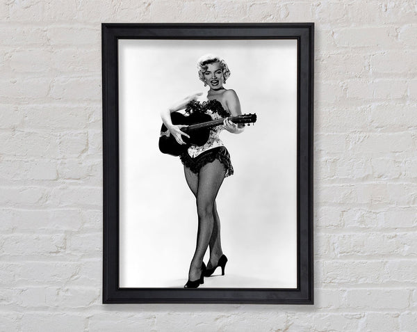 Marilyn Monroe Playing Guitar Framed Print