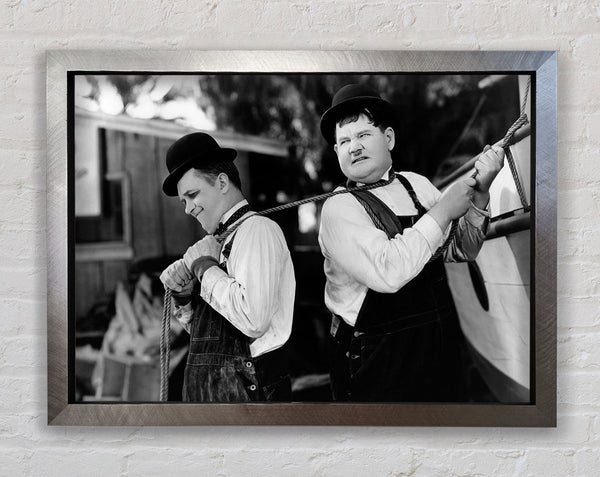 Laurel And Hardy Heave Framed Print
