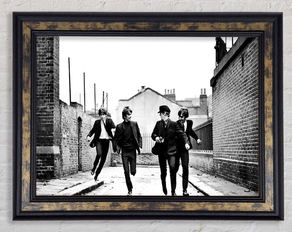 The Beatles Running Framed Print