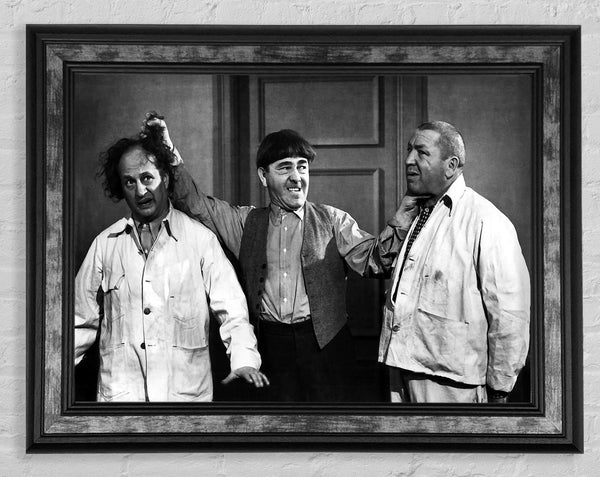 The Three Stooges Ear Twist Framed Print