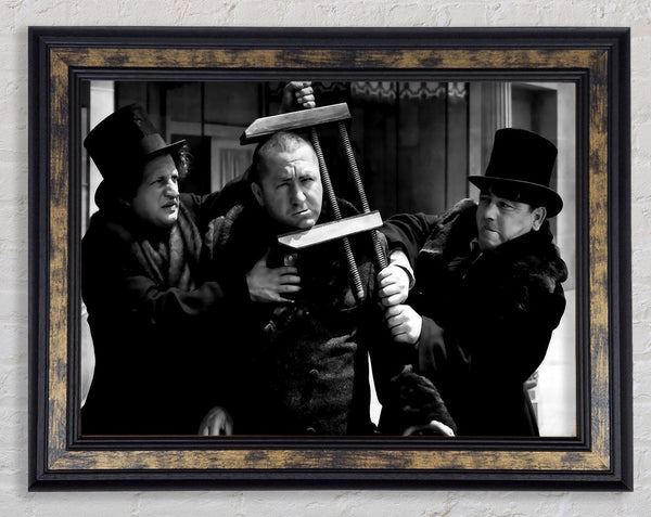 The Three Stooges Head Clamp Framed Print
