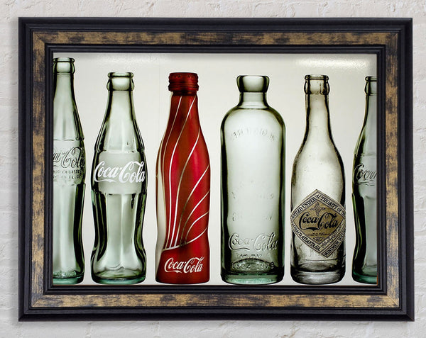 Old Coca Cola Bottles Framed Print