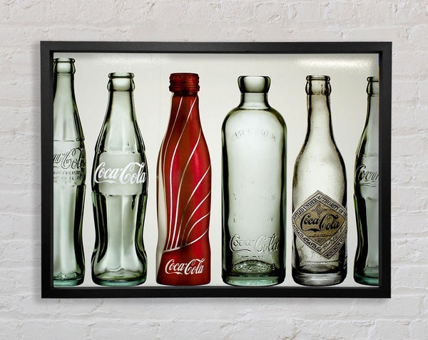 Old Coca Cola Bottles Framed Print