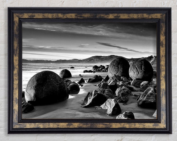 Rocks On A Beach Framed Print