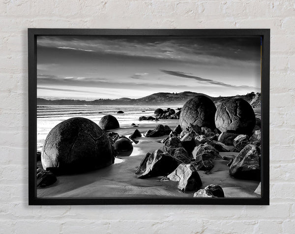 Rocks On A Beach Framed Print