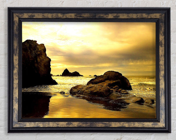 Rocky Beach At Yellow Dawn Framed Print