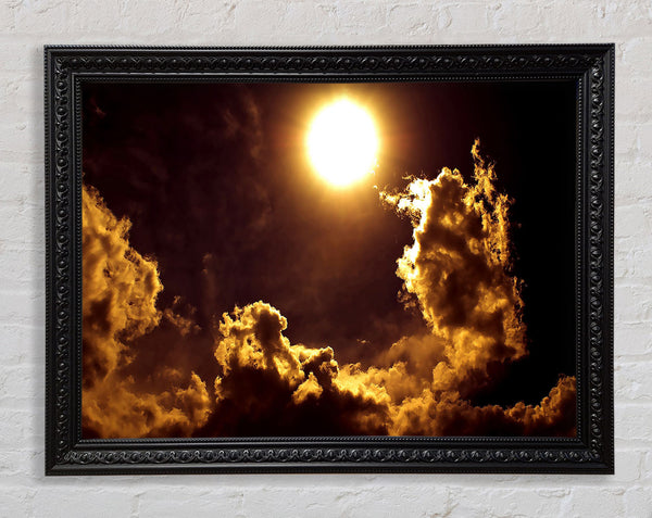 Golden Clouds Framed Print