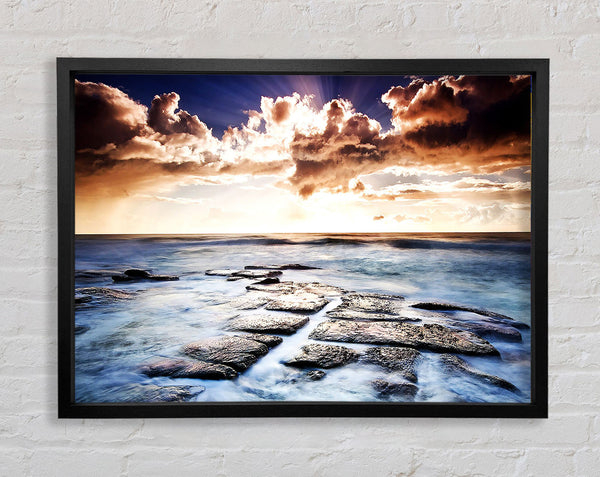 Ocean Shore Below The Clouds Framed Print