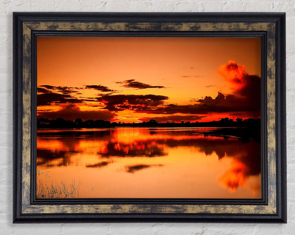 Sunset Cloud Reflection Framed Print