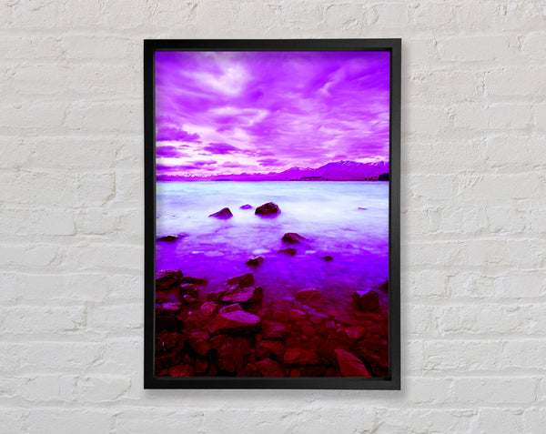 Purple Skies Over The Turquoise Ocean Framed Print