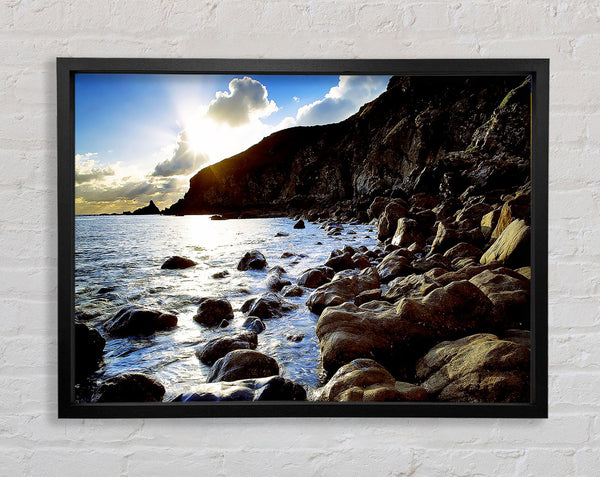 Sun Kissed Ocean Rocks Framed Print