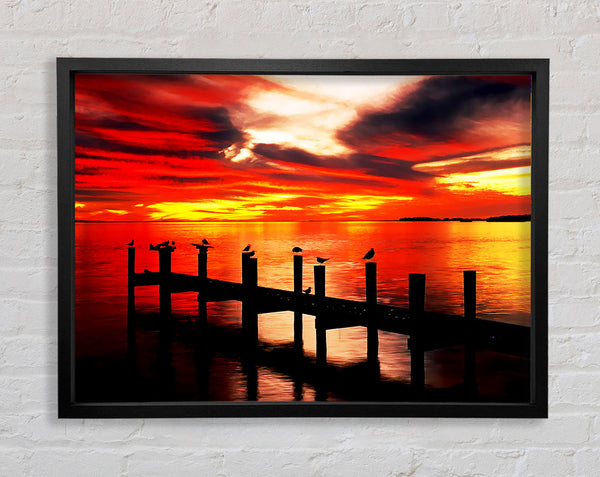 Pier Fire Sky Framed Print