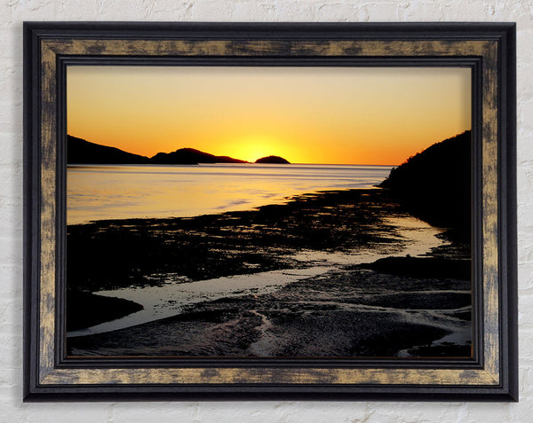 Golden Sunrise Over The Ocean Framed Print
