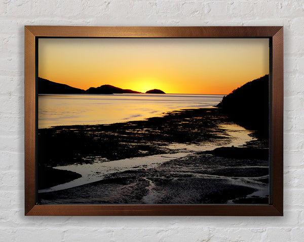 Golden Sunrise Over The Ocean Framed Print