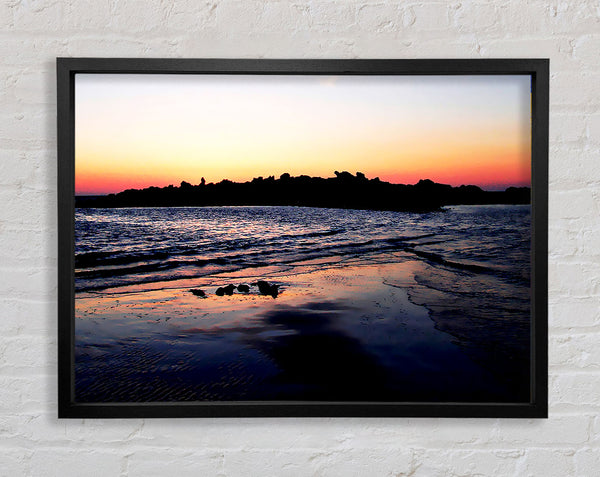 Sunset Behind The Ocean Rocks Framed Print