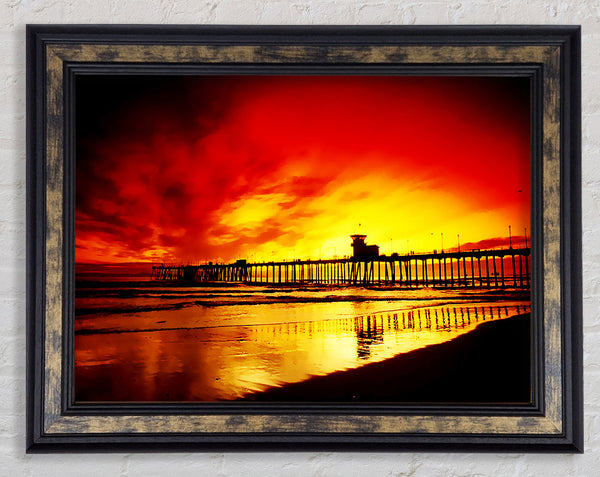 Fire Skies Over The Pier Framed Print