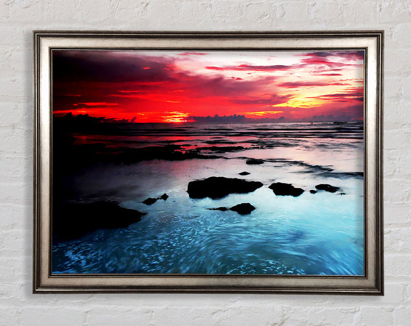 Lava Red Skies Over The Turquoise Ocean Framed Print