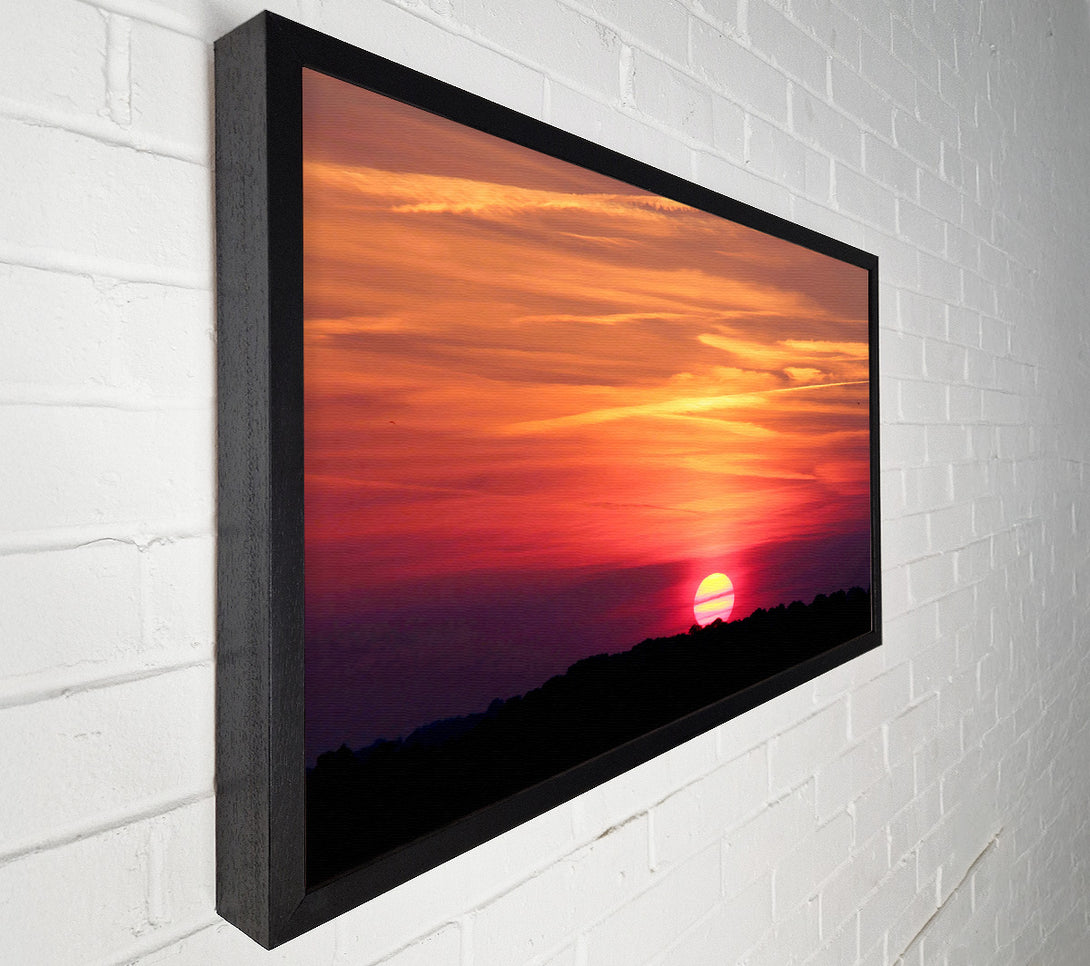  A Canvas Print of Clouds Across The Setting Sun Canvas Print