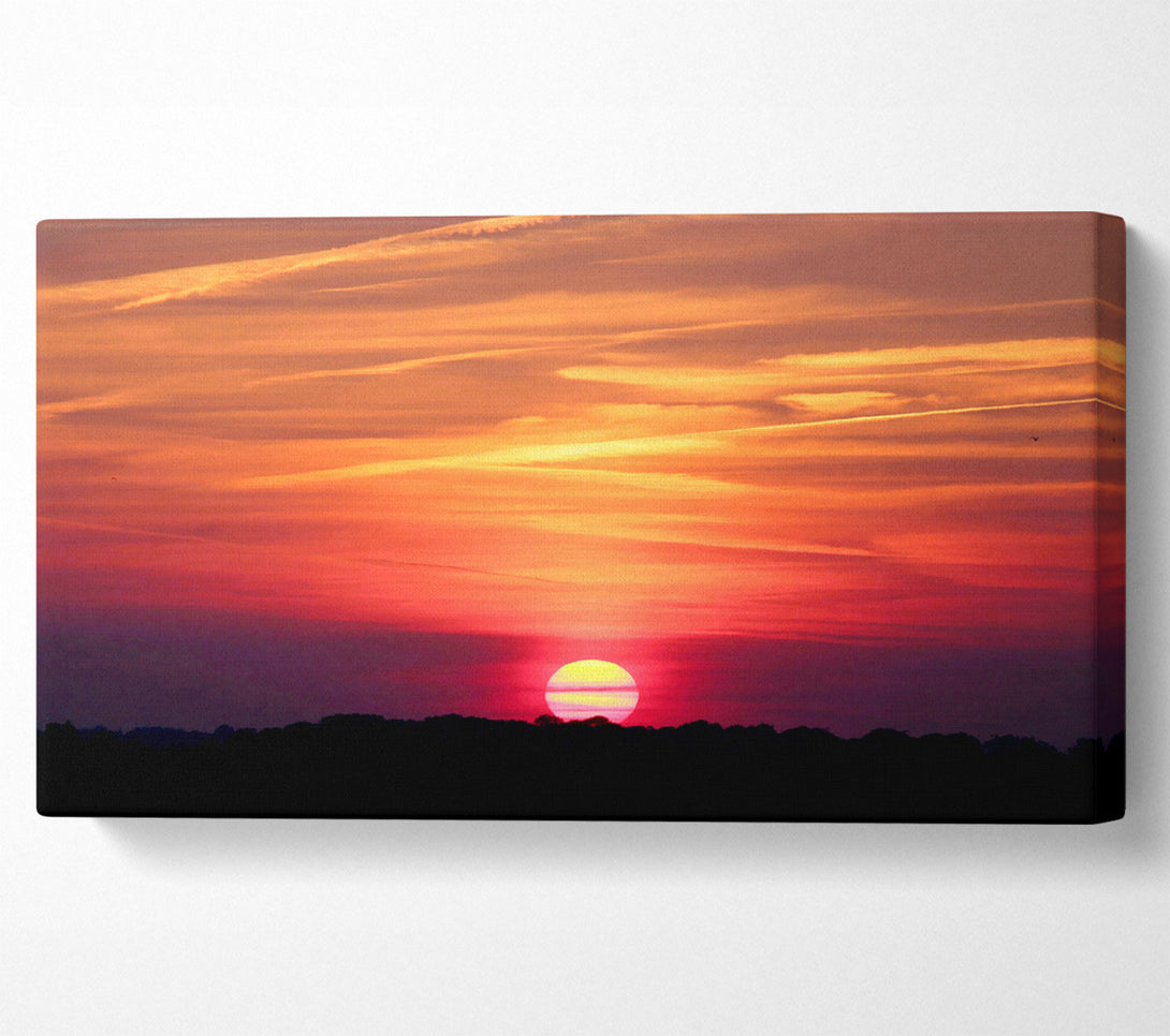  A Canvas Print of Clouds Across The Setting Sun Canvas Print