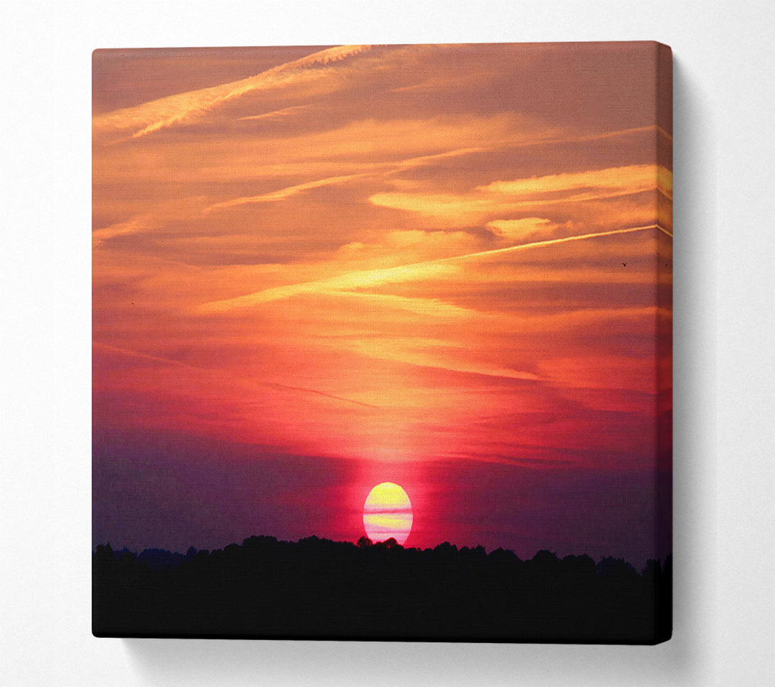  A Canvas Print of Clouds Across The Setting Sun Canvas Print