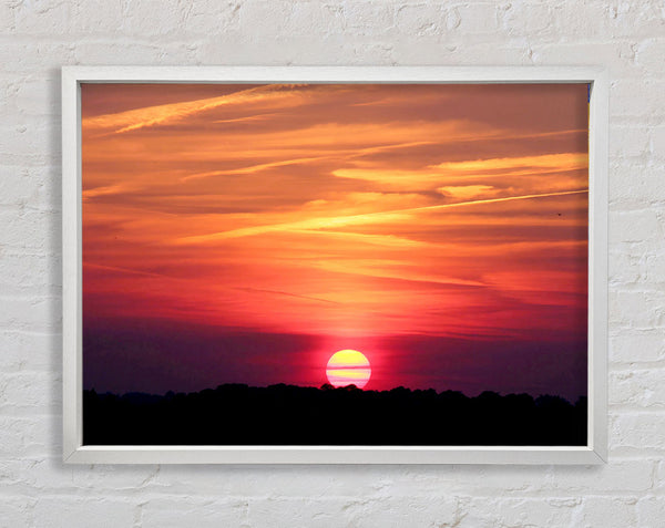Clouds Across The Setting Sun Framed Print