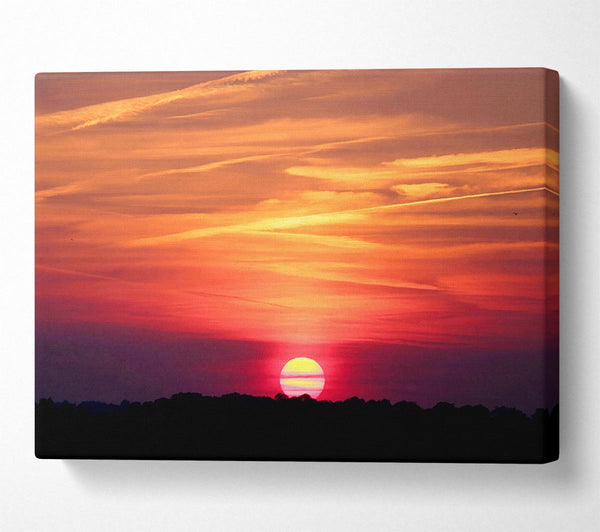  A Canvas Print of Clouds Across The Setting Sun Canvas Print