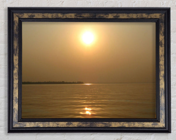 Tranquil Misty Sun Framed Print